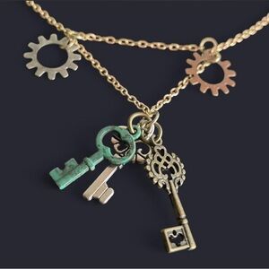 Mixed-Metal Vintage Key Charm Necklace and matching earrings